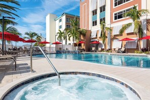 Outdoor pool, free pool cabanas, pool umbrellas