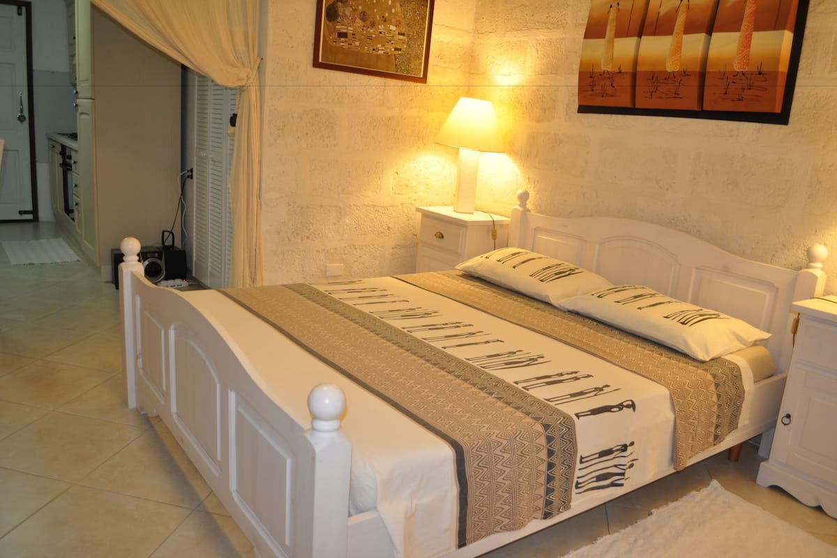 studio, garden view (white coconut) | in-room safe, desk, iron/ironing board, cots/infant beds