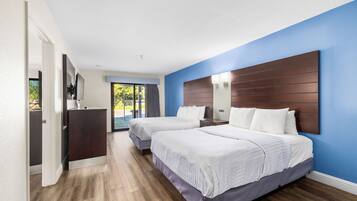 Family Suite, 2 Bedrooms, Refrigerator & Microwave | Desk, blackout drapes, iron/ironing board, free WiFi