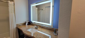 Superior Room, Multiple Beds, Refrigerator & Microwave | Bathroom | Combined shower/bathtub, free toiletries, hair dryer, towels