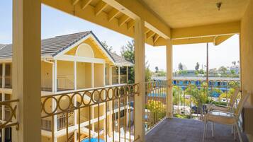 Deluxe Room, 2 Queen Beds, Refrigerator & Microwave | Balcony