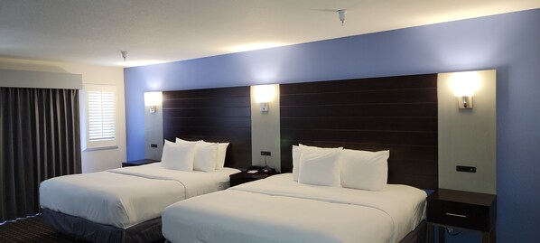 Superior Room, Multiple Beds, Refrigerator & Microwave | Desk, blackout curtains, iron/ironing board, free WiFi