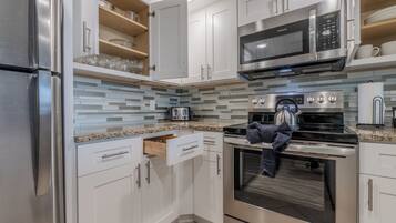 Standard Apartment, 2 Bedrooms, Ocean View | Private kitchen | Coffee/tea maker, fridge, microwave, oven