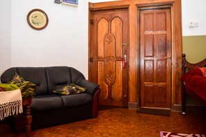 Standard Double Room | Living area | Flat-screen TV