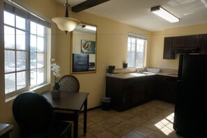 Family Double Room, 2 Queen Beds | Private kitchen | Fridge