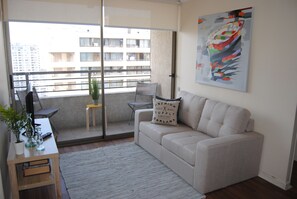 Apartamento standard | Área de estar | TV de tela plana