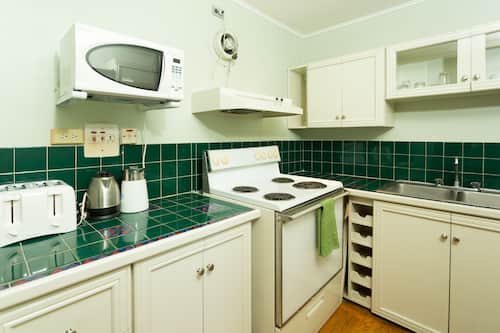 Exclusive Apartment, 1 Bedroom, City View, Executive Level | Private kitchen | Full-sized fridge, microwave, oven, stovetop
