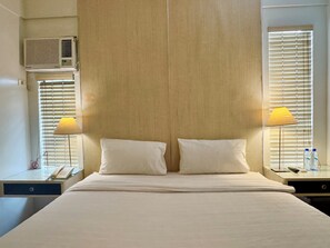Classic Room, 1 Queen Bed, Non Smoking | 1 bedroom, minibar, in-room safe, individually decorated