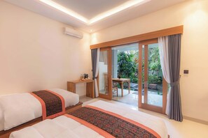 Room | Premium bedding, desk, free WiFi, bed sheets - Suastika Lodge (Ubud)