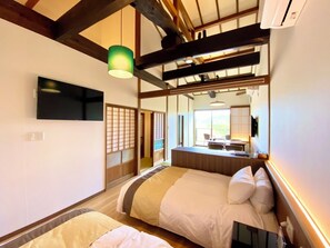Luxury Twin Room, Mountain View | Down comforters, in-room safe, individually decorated