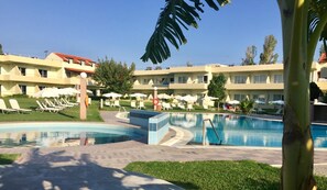 Outdoor pool, pool umbrellas, pool loungers