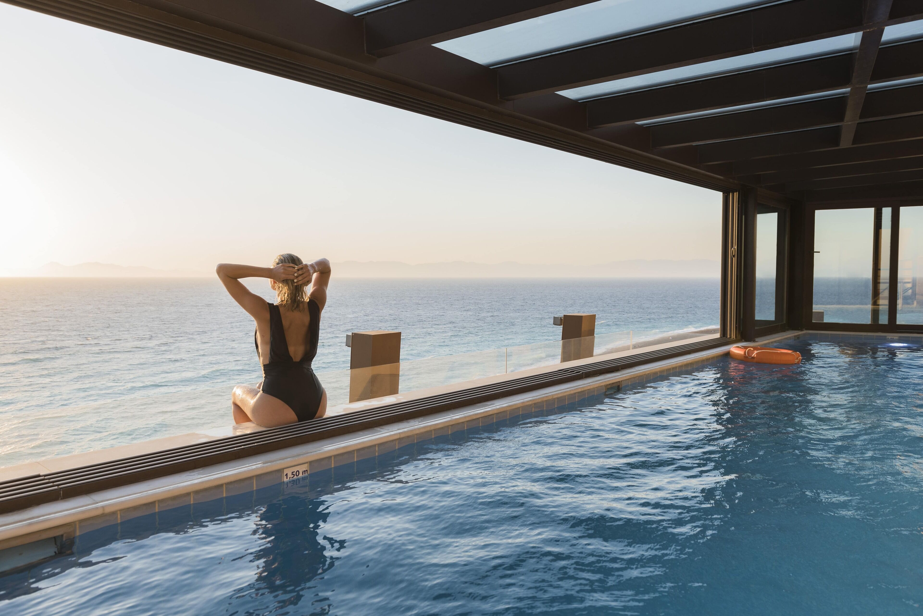 indoor pool, outdoor pool, pool umbrellas, pool loungers