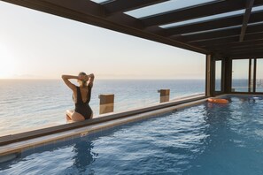 Indoor pool, outdoor pool, pool umbrellas, sun loungers