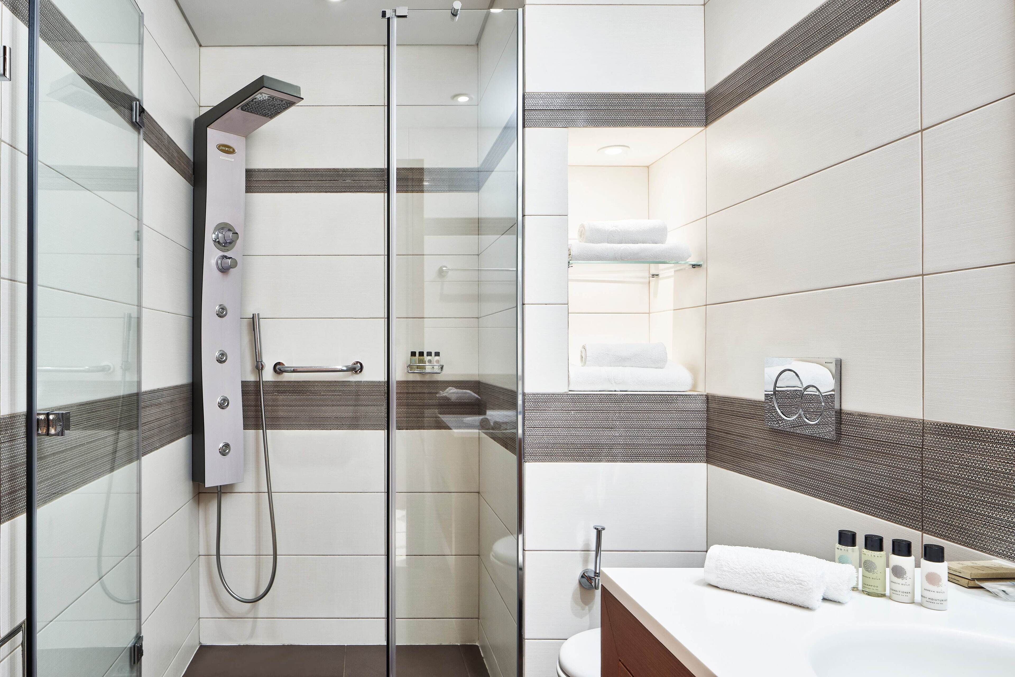 shower, rainfall showerhead, designer toiletries, hair dryer