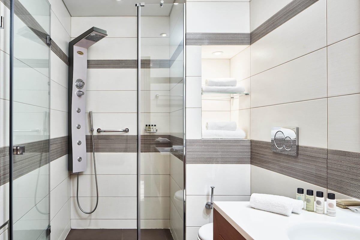 shower, rainfall showerhead, designer toiletries, hair dryer