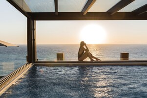 Indoor pool, outdoor pool, pool umbrellas, sun loungers