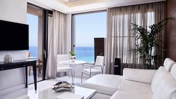 Penthouse | Living area | 50-inch Smart TV with satellite channels, TV, Netflix