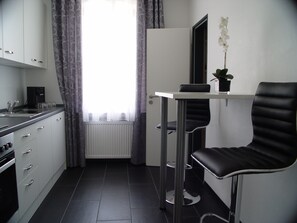 Superior-Apartment, 1 Schlafzimmer | Eigene Küche | Kühlschrank, Mikrowelle, Ofen, Herdplatte