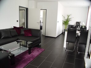 Appartement Supérieur, 1 chambre | Coin séjour | Télévision à écran plat, lecteur de DVD