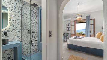 Deluxe Room, Sea View | In-room safe, individually decorated, individually furnished, desk