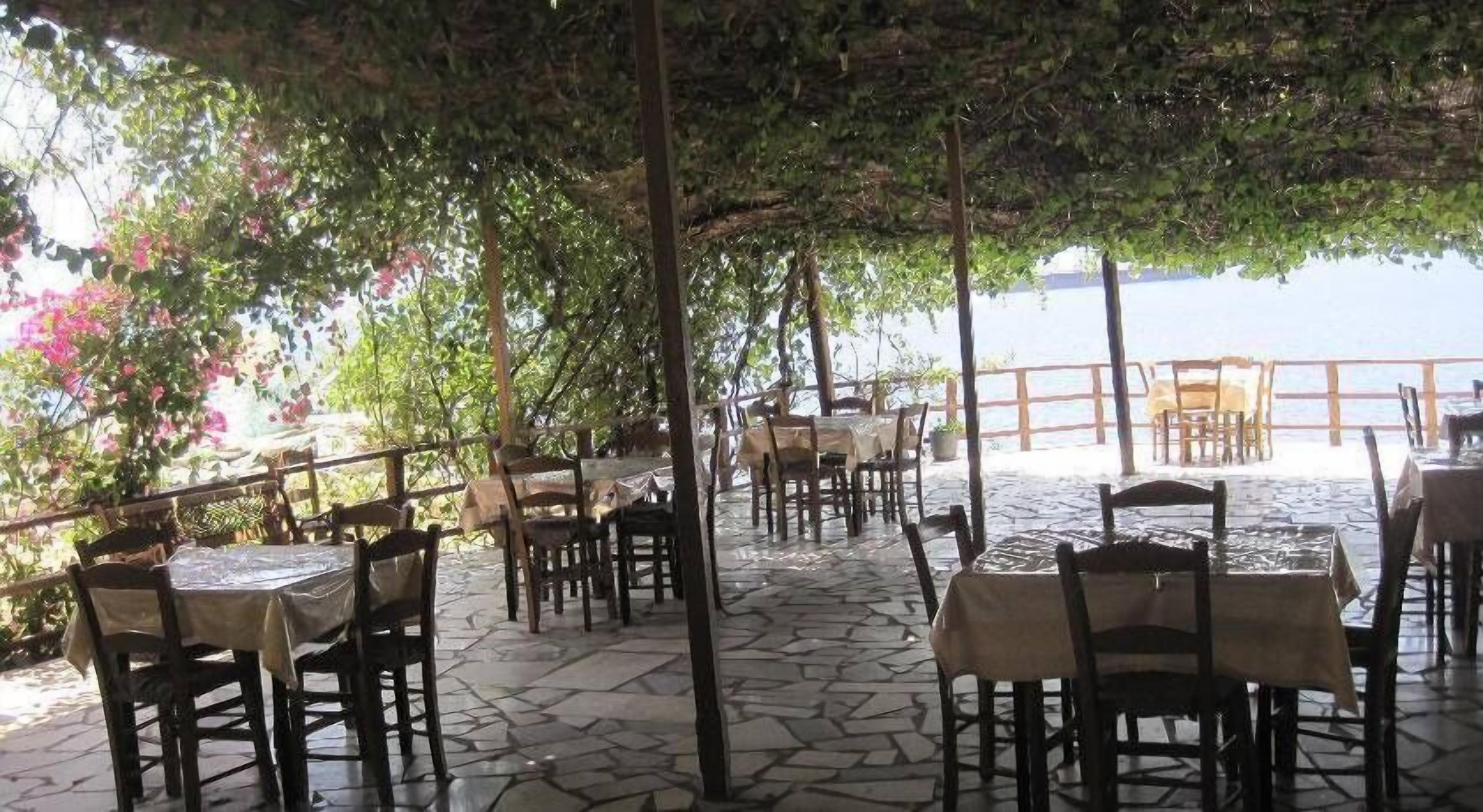 Breakfast, lunch, dinner served; Greek cuisine, beach views 