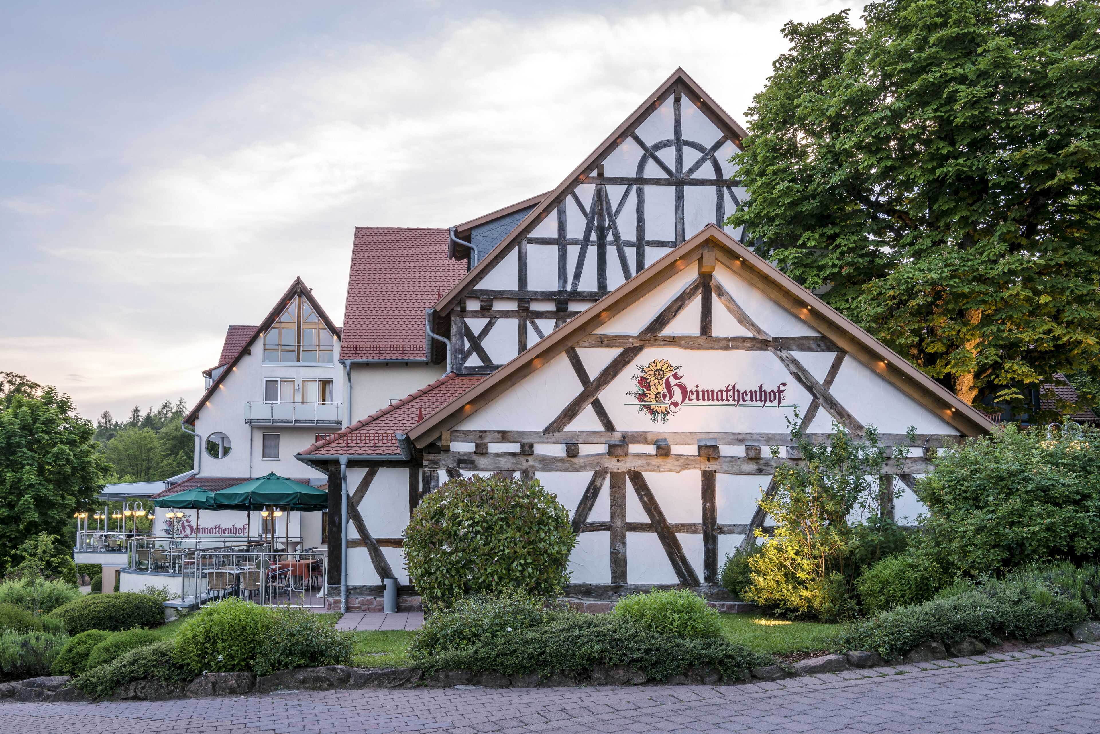 A traditional half-timbered building with a sign reading "Seimathenhof".