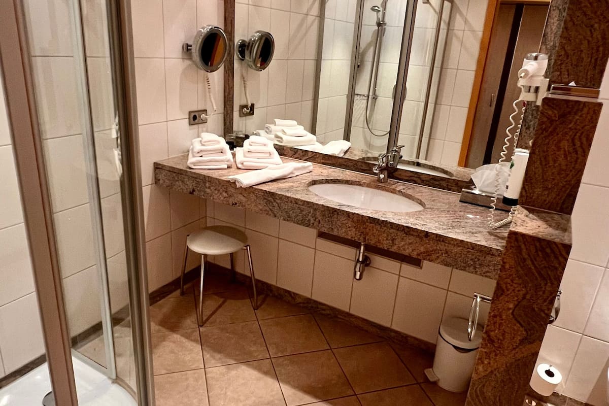 free toiletries, hair dryer, bathrobes, slippers