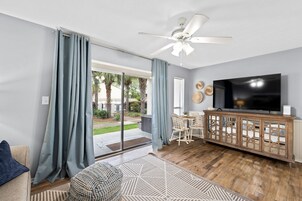 Condo, 1 Bedroom, Resort View (E5) | Living area | Flat-screen TV