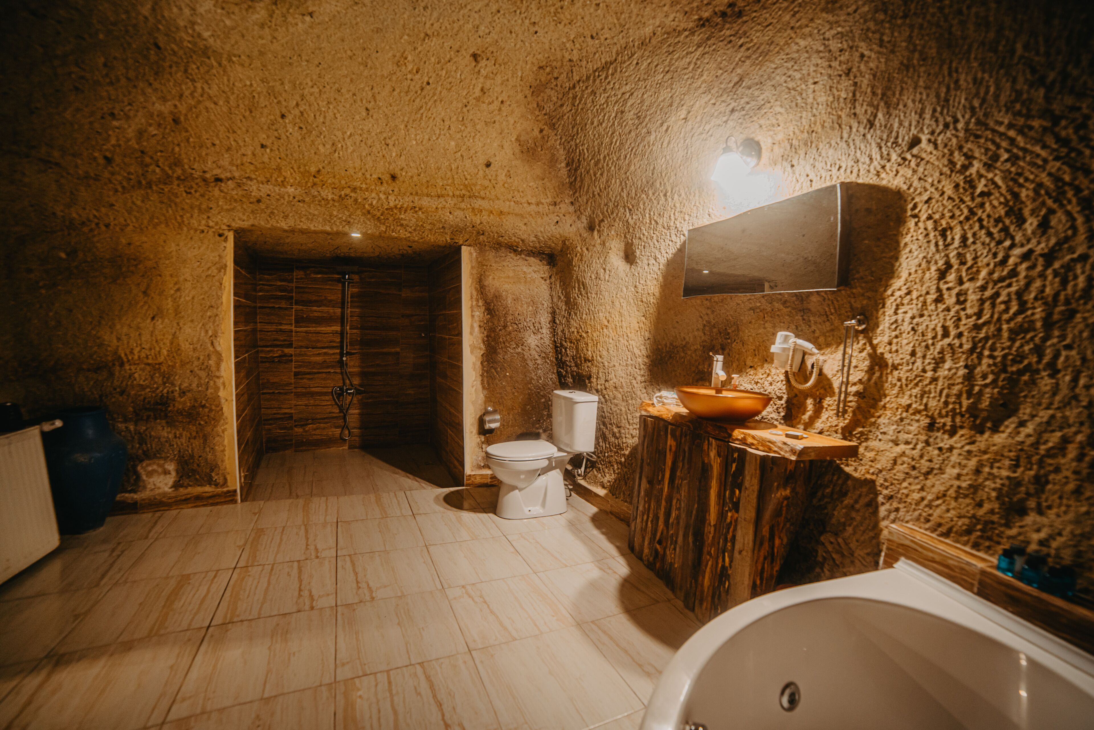 romantic suite | bathroom | deep-soaking bathtub, free toiletries, hair dryer, slippers