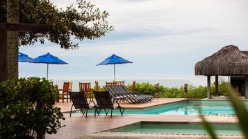 Outdoor pool, open 8:00 AM to 10:00 PM, pool umbrellas, pool loungers