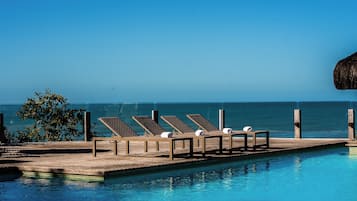 Outdoor pool, open 8:00 AM to 10:00 PM, pool umbrellas, pool loungers