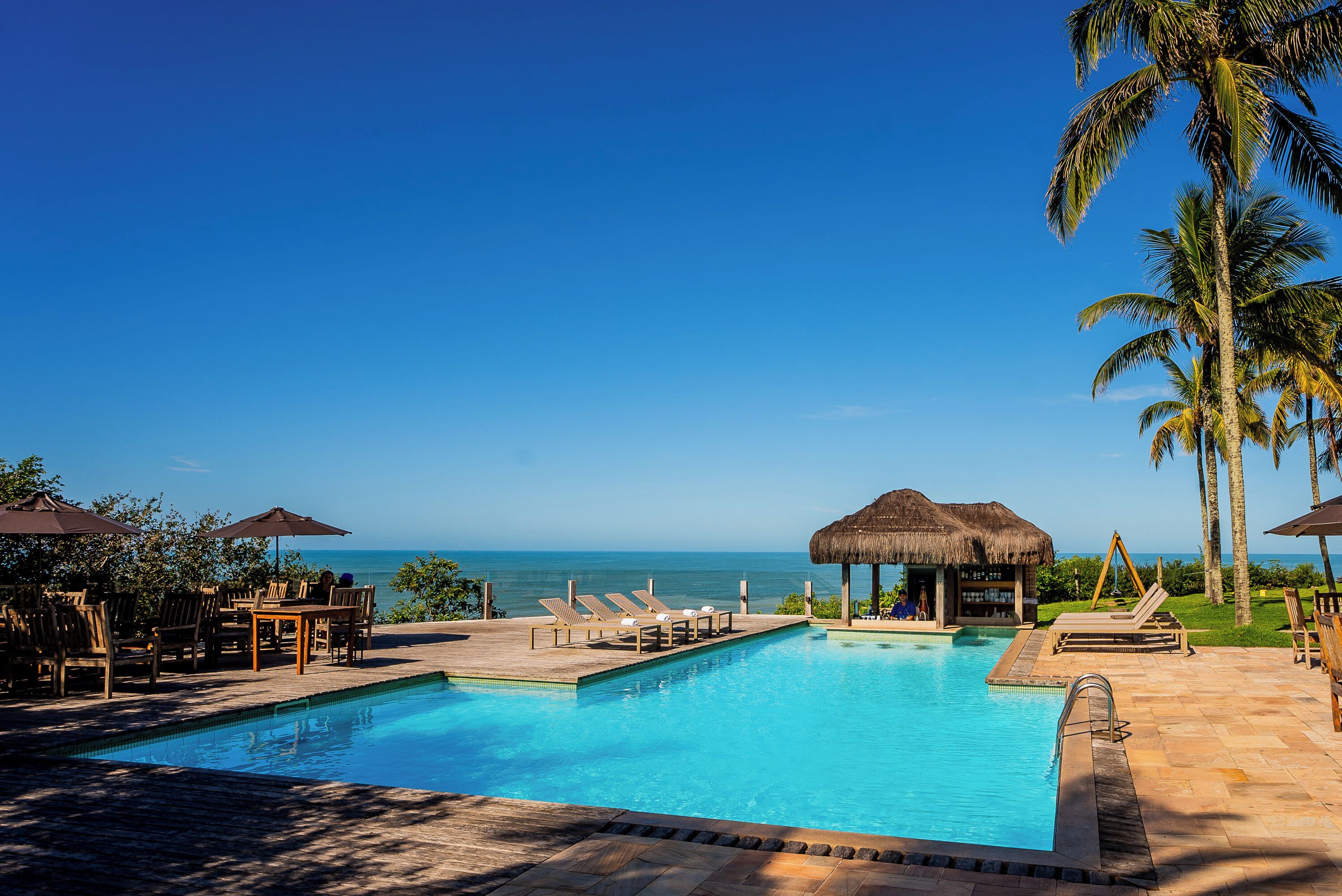 Outdoor pool, open 8:00 AM to 10:00 PM, pool umbrellas, pool loungers