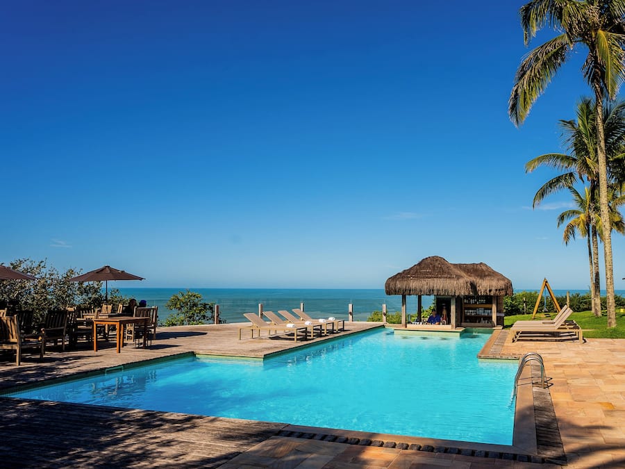 Outdoor pool, open 8:00 AM to 10:00 PM, pool umbrellas, pool loungers