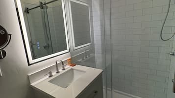 Shower, free toiletries, hair dryer, towels