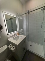 Shower, free toiletries, hair dryer, towels