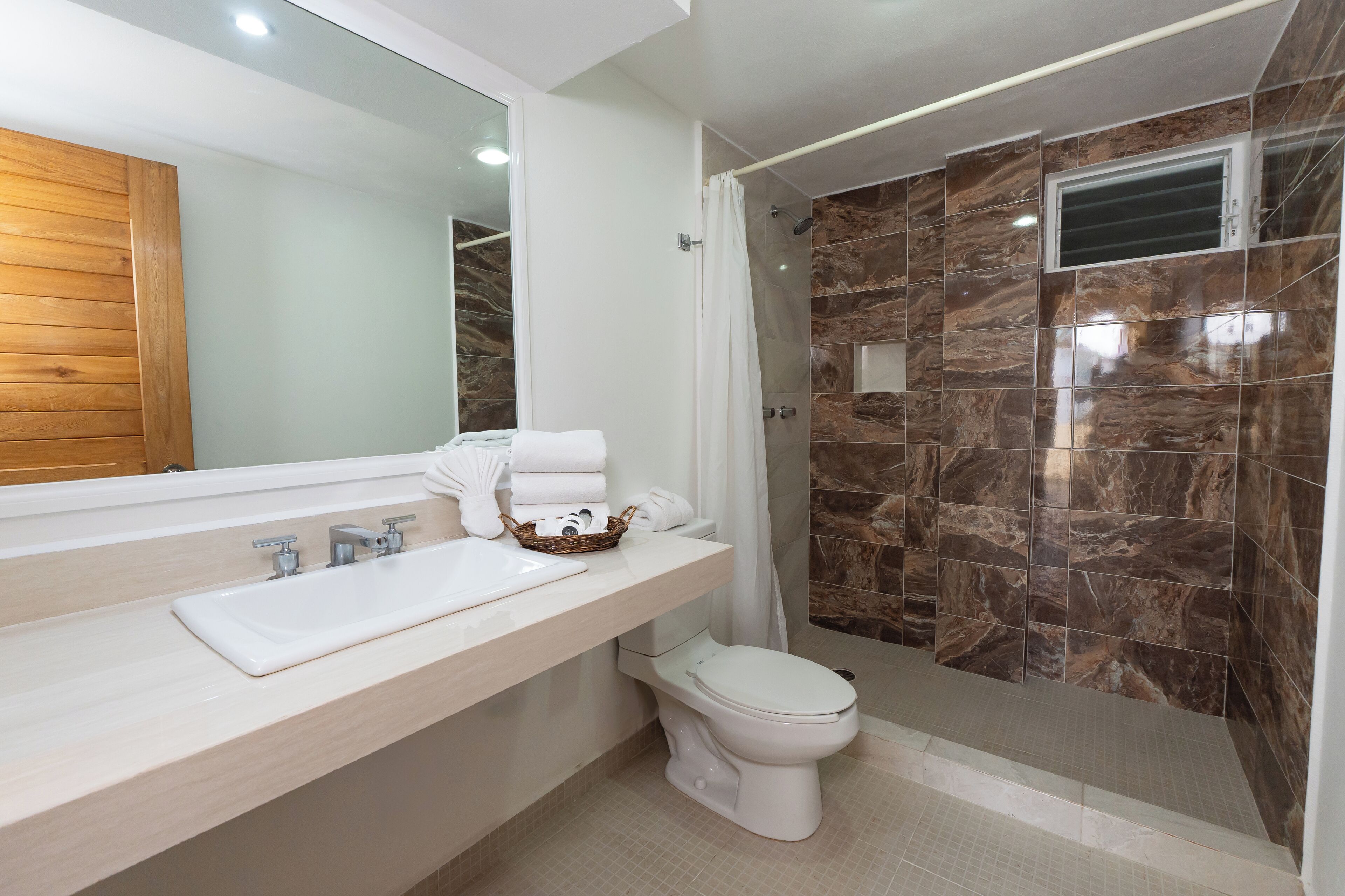 shower, free toiletries, hair dryer, towels