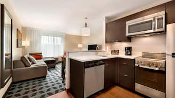 Desk, laptop workspace, blackout drapes, iron/ironing board