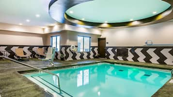 Indoor pool, open 6:00 AM to 10:00 PM, pool loungers