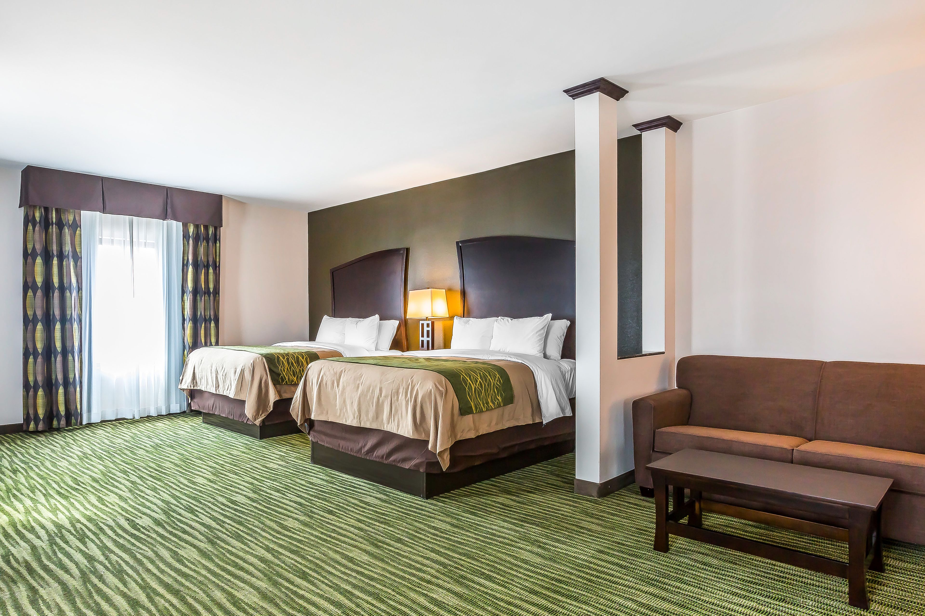 suite, multiple beds, non smoking (2 queen, 2 person sofa bed) | living area | 42-inch tv with digital channels