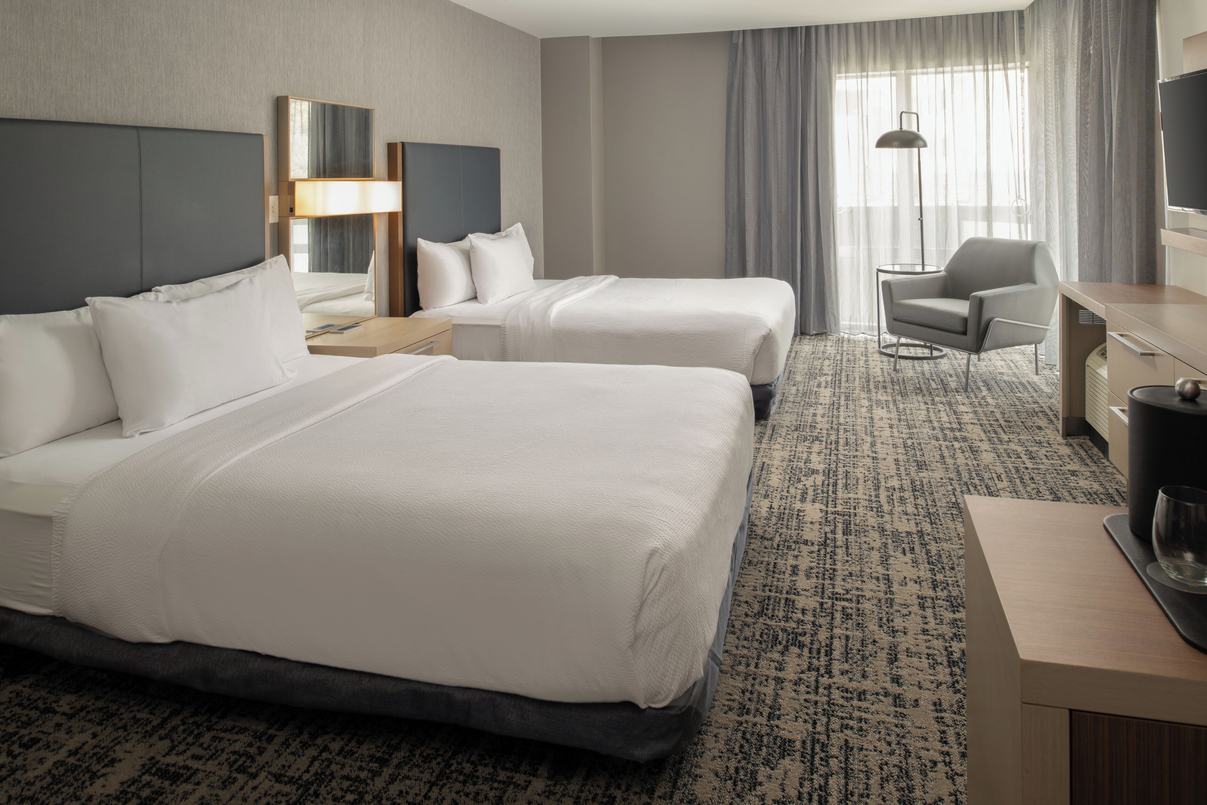 executive suite, 2 queen beds | premium bedding, desk, laptop workspace, iron/ironing board