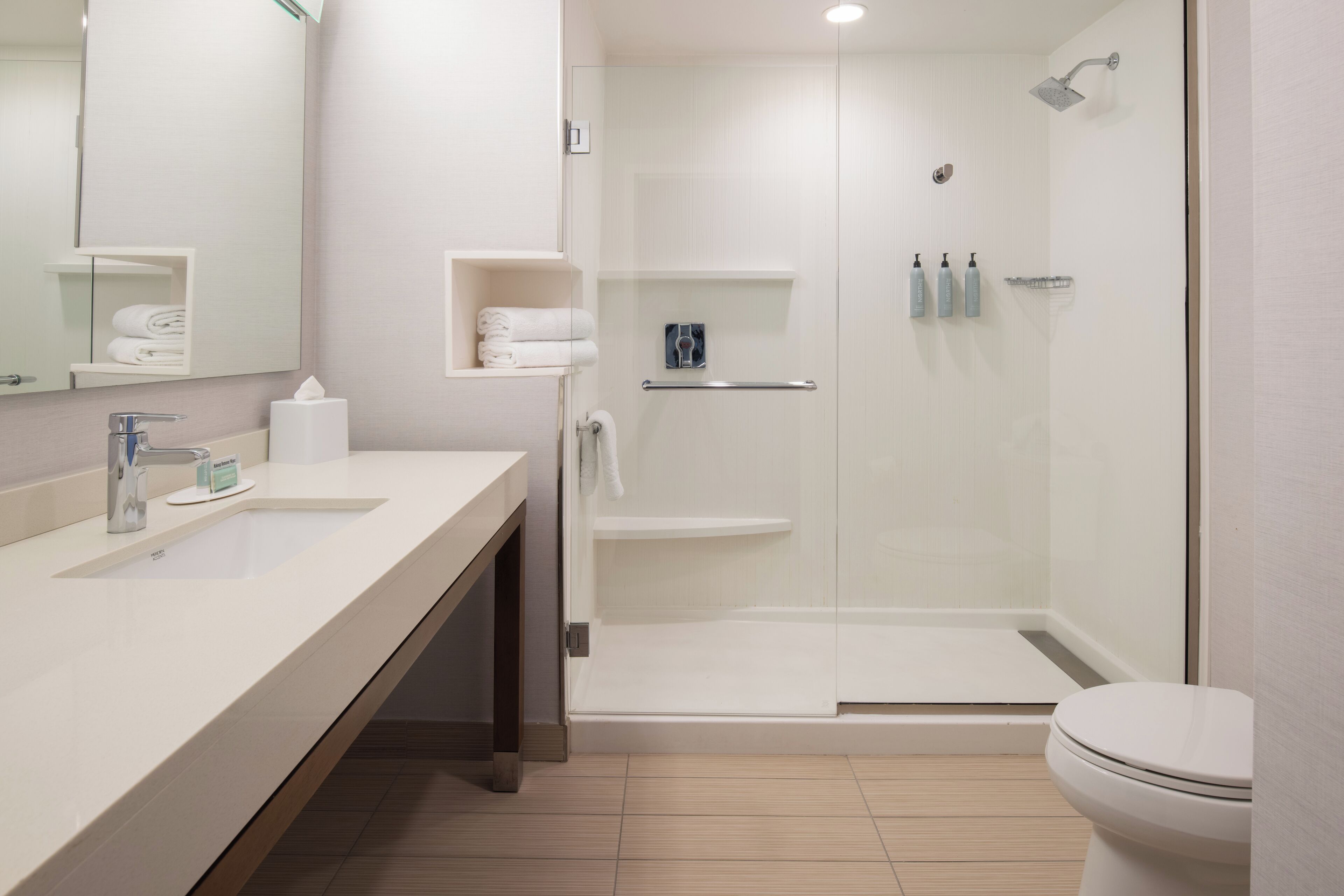 combined shower/bathtub, free toiletries, hair dryer, towels