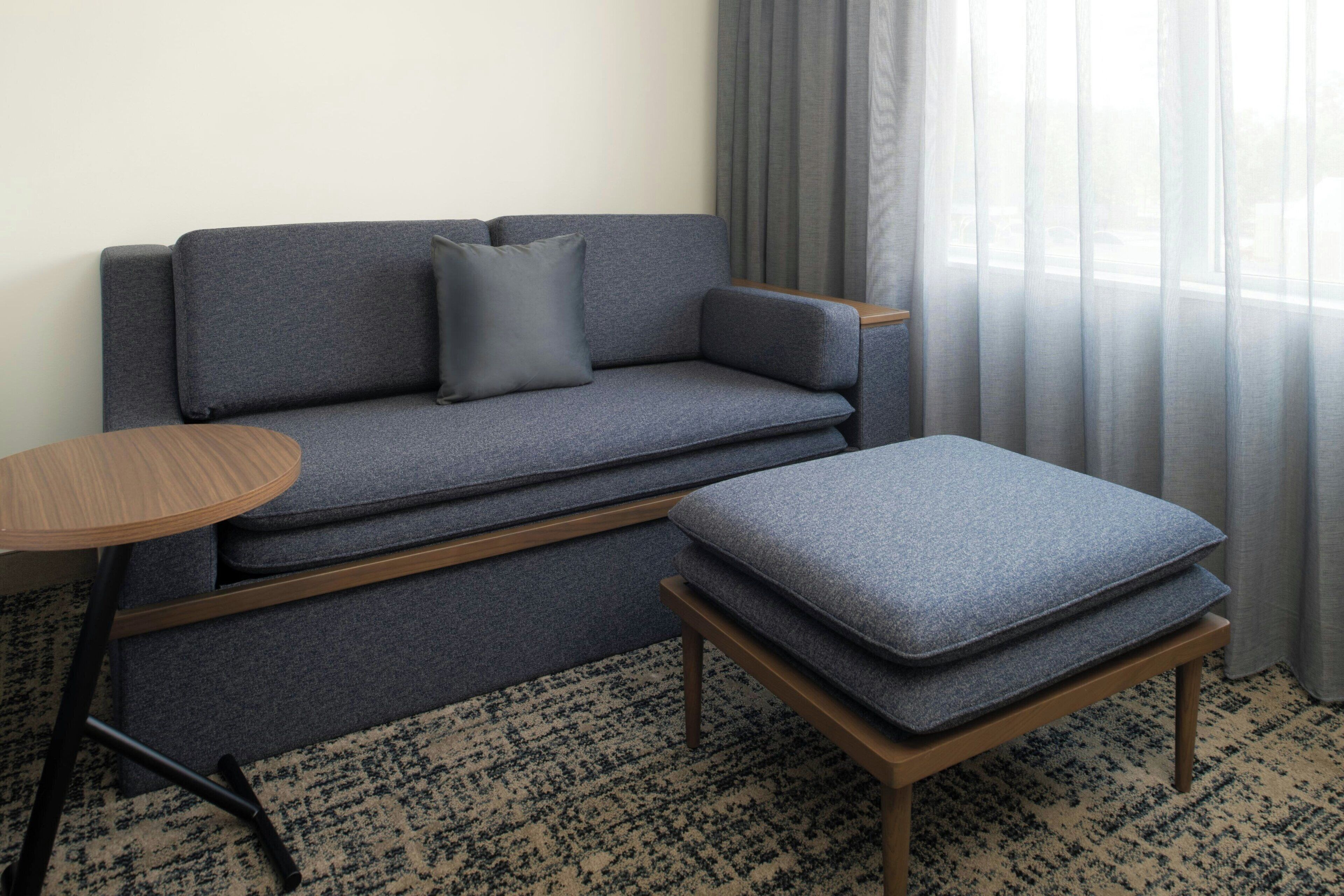 Premium bedding, desk, laptop workspace, iron/ironing board