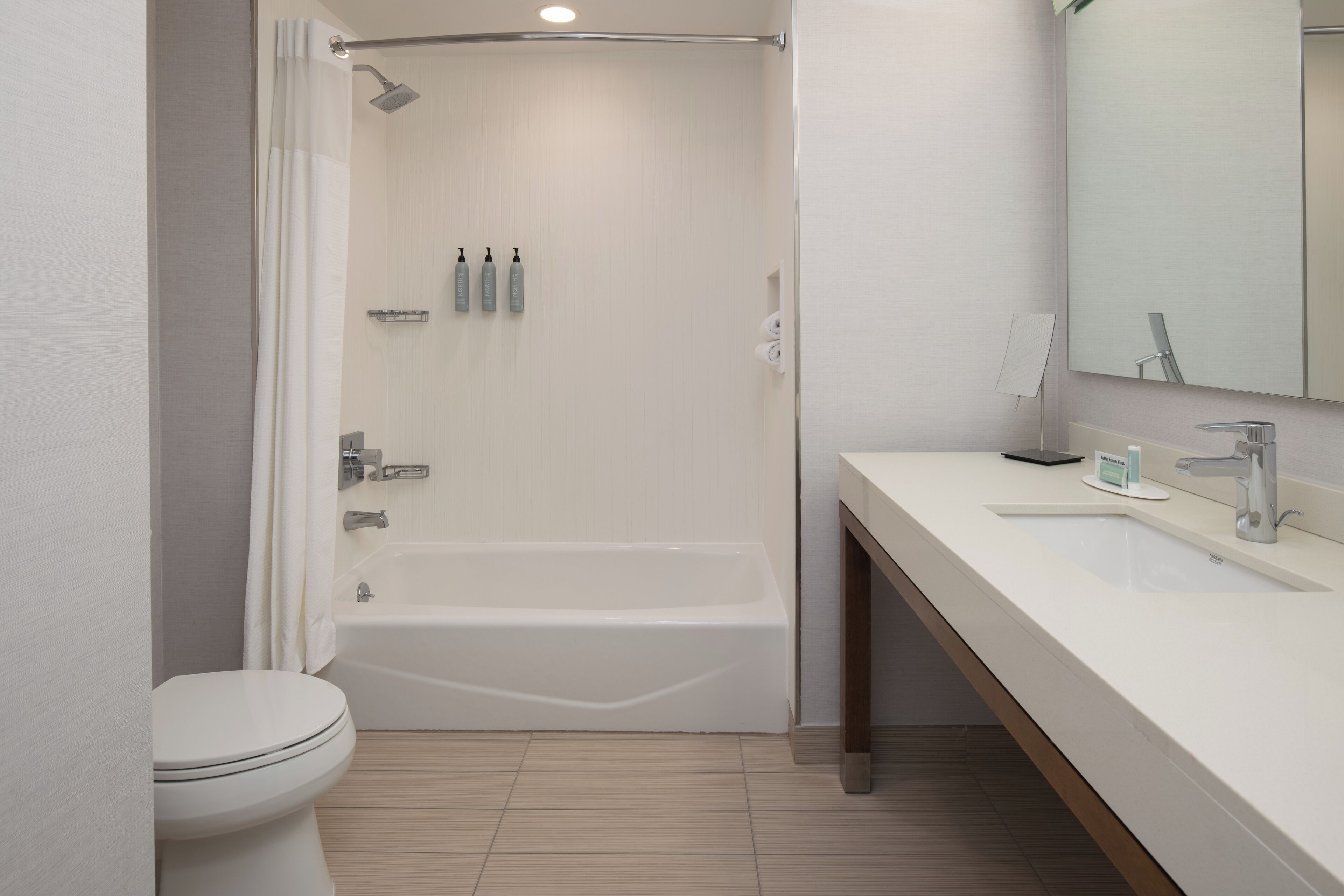 combined shower/bathtub, free toiletries, hair dryer, towels