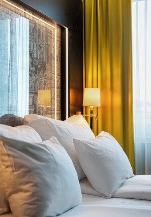 Ropa de cama de alta calidad, colchones con pillow-top y minibar