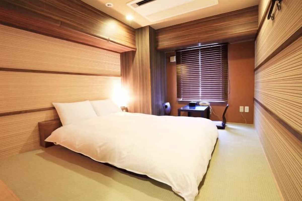 Desk, blackout curtains, free WiFi, bed sheets
