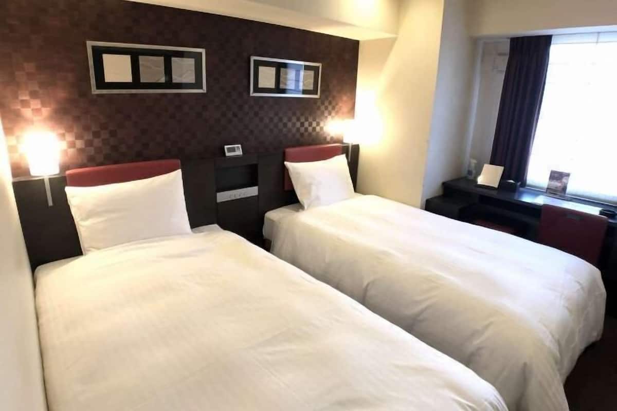 Desk, blackout curtains, free WiFi, bed sheets