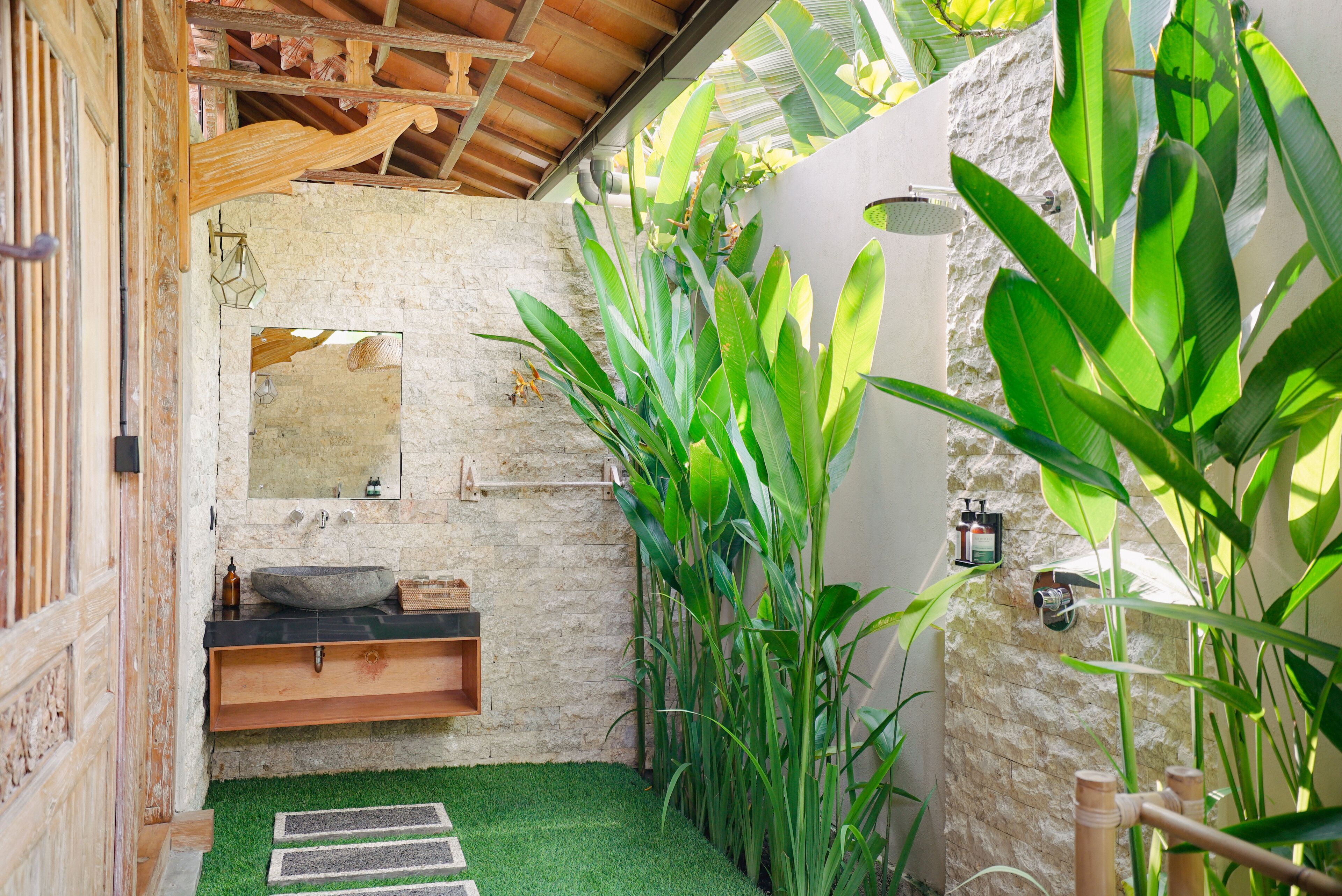 one bedroom pool villa | bathroom | designer toiletries, hair dryer, slippers, towels