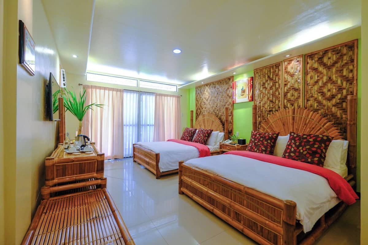 Minibar, desk, laptop workspace, bed sheets