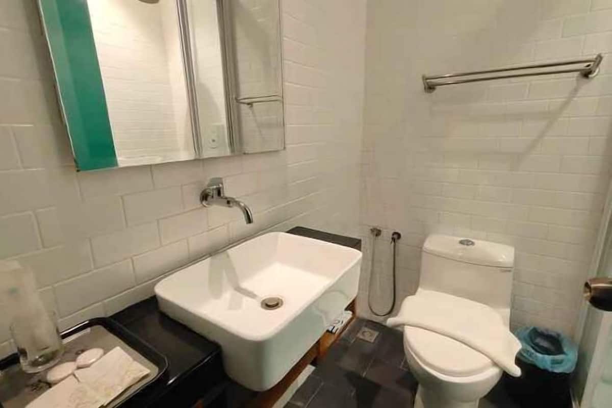 Bathroom | Shower, free toiletries, hair dryer, slippers