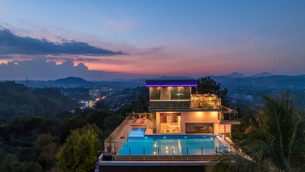 A modern hotel with a rooftop pool, offering panoramic views of the surrounding landscape. - View 360 (Kandy)